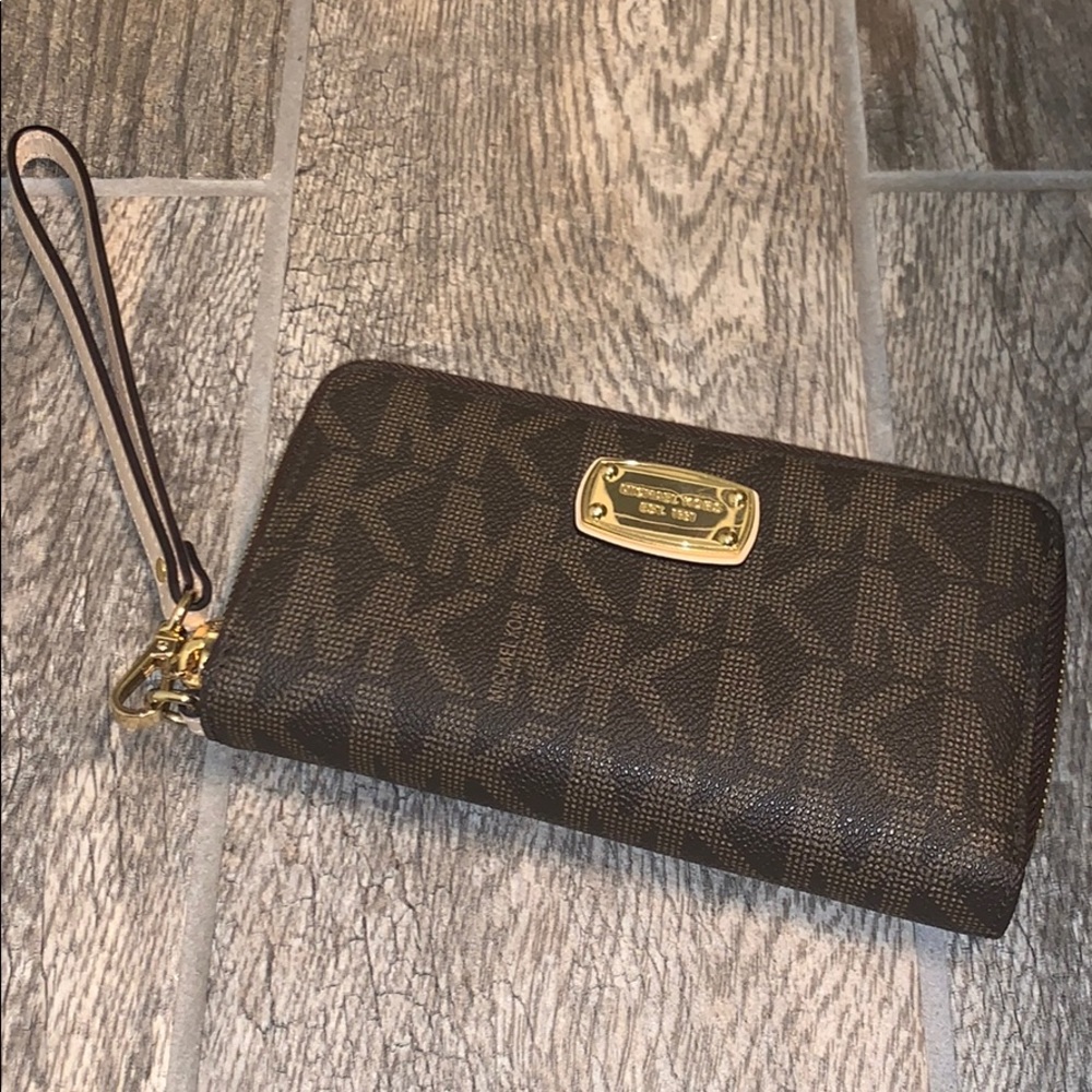 Michael Kors monogram wristlet, like new